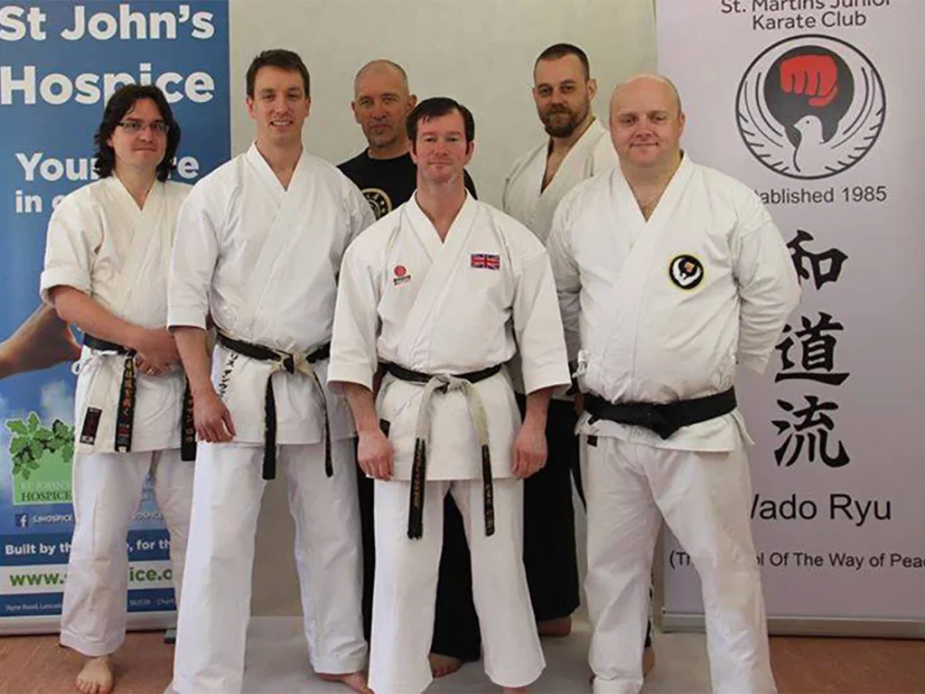 Group photo showing St Martins Junior Karate Club members alongside representatives from other martial arts clubs