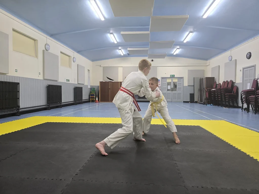 Students practising a partner technique at St Martins Karate Carnforth